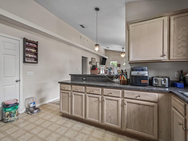172 Mohave Rd, Crawfordville, FL 32327 - kitchen with a peninsula, light floors, pendant lighting, a ceiling fan, and light brown cabinets