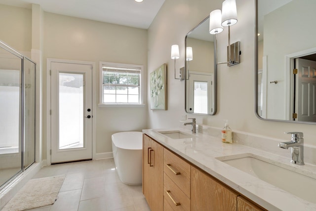 3690 Dexter Dr, Tallahassee, FL 32312 - full bath with a shower stall, a soaking tub, double vanity, and tile patterned floors