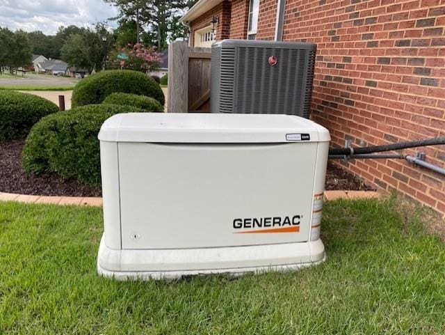 4664 Fledgling Dr, Tallahassee, FL 32311 - exterior view of a power unit, central AC unit, and brick siding