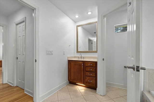 4664 Fledgling Dr, Tallahassee, FL 32311 - bathroom featuring vanity, baseboards, and tile patterned flooring