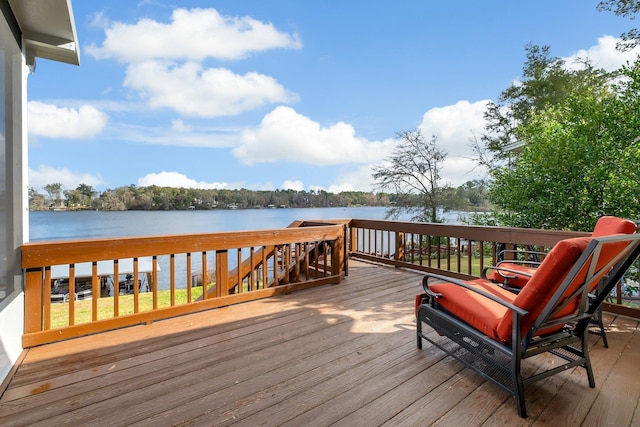 deck featuring a water view