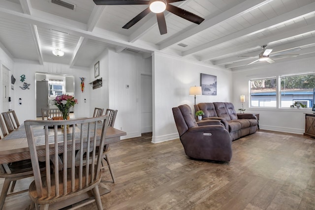 living room featuring beamed ceiling, ceiling fan, wood ceiling, and hardwood / wood-style floors