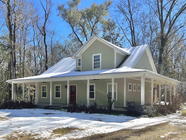 farmhouse featuring covered porch