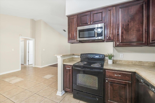 kitchen with dishwashing machine, black electric range oven, and light tile patterned flooring