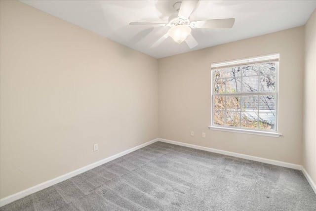 unfurnished room featuring carpet flooring and ceiling fan