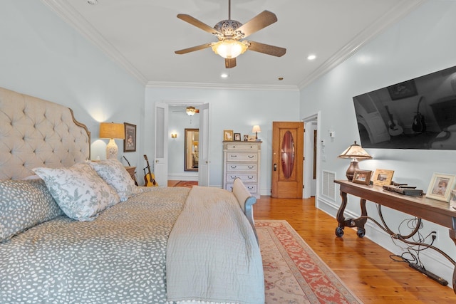 bedroom with recessed lighting, light wood-style floors, ceiling fan, crown molding, and visible vents