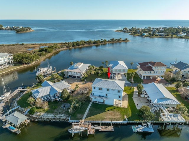 drone / aerial view with a water view