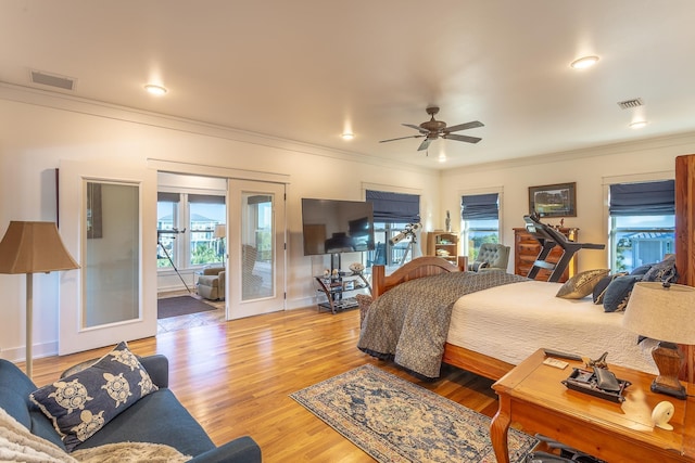 bedroom with french doors, crown molding, ceiling fan, access to exterior, and light hardwood / wood-style floors