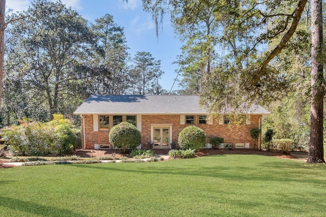 view of front of home featuring french doors and a front lawn