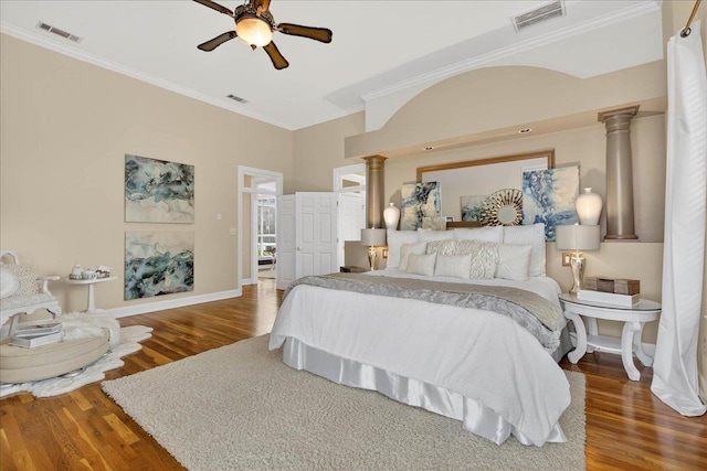 7502 Refuge Rd, Tallahassee, FL 32312 - bedroom featuring decorative columns, ornamental molding, wood finished floors, and a ceiling fan