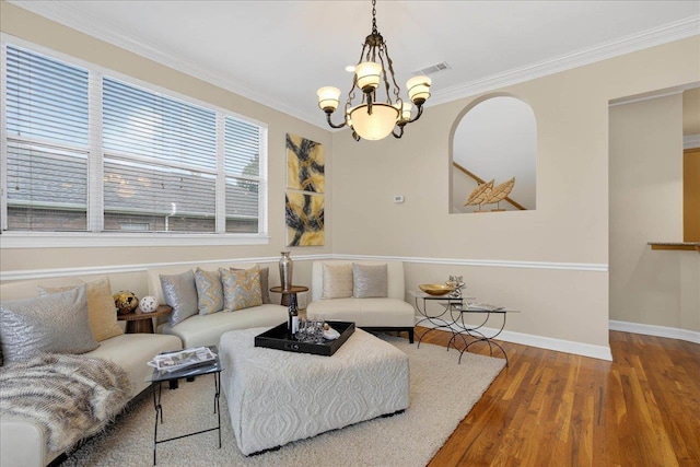 7502 Refuge Rd, Tallahassee, FL 32312 - living area featuring a chandelier, wood finished floors, and ornamental molding
