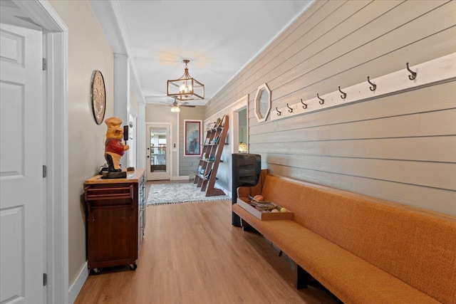 231 Sheline Dr, Havana, FL 32333 - corridor featuring a chandelier, wood finished floors, baseboards, and crown molding
