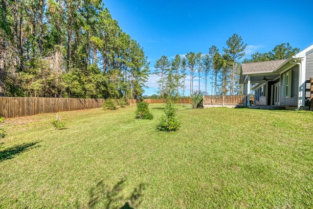 view of yard featuring ceiling fan