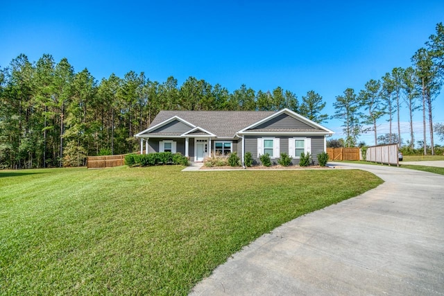 ranch-style house featuring a front lawn