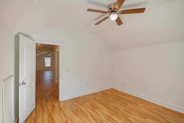 bonus room featuring light hardwood / wood-style flooring, ceiling fan, and lofted ceiling