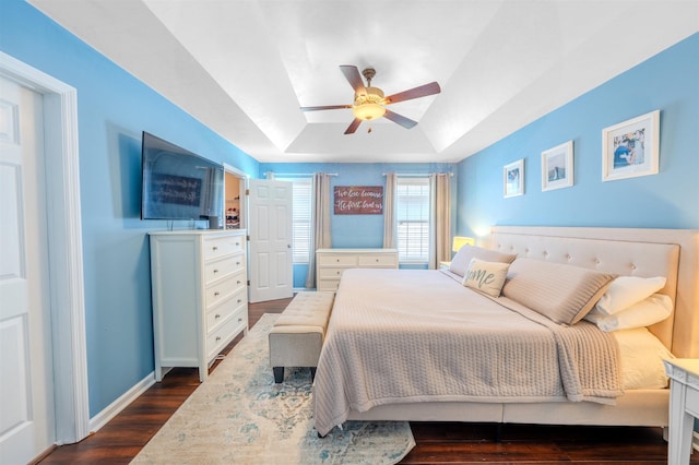 1842 Acorn Ridge Trl, Tallahassee, FL 32312 - bedroom with a tray ceiling, dark wood-style flooring, baseboards, and ceiling fan