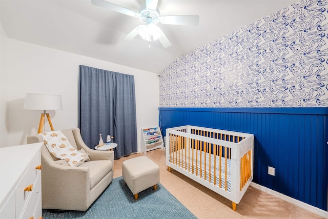 1842 Acorn Ridge Trl, Tallahassee, FL 32312 - bedroom with vaulted ceiling, a nursery area, carpet flooring, a wainscoted wall, and ceiling fan