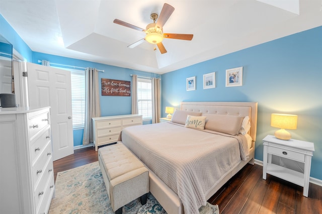 1842 Acorn Ridge Trl, Tallahassee, FL 32312 - bedroom with a raised ceiling, wood finished floors, baseboards, and a ceiling fan