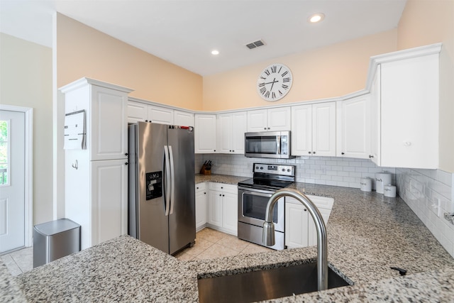 1842 Acorn Ridge Trl, Tallahassee, FL 32312 - kitchen featuring stainless steel appliances, a sink, white cabinetry, and recessed lighting