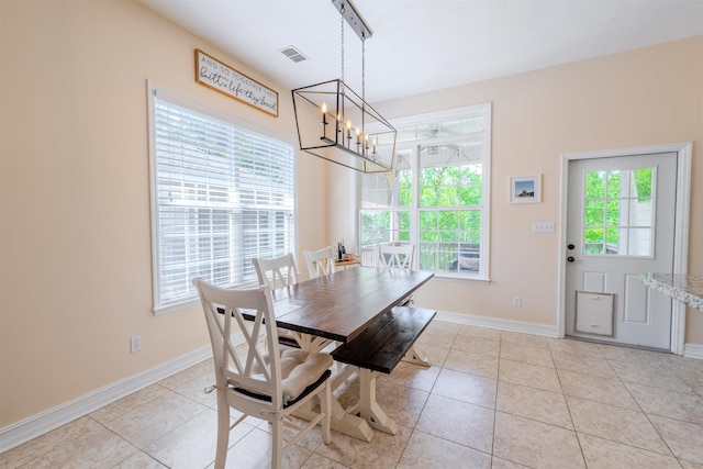 1842 Acorn Ridge Trl, Tallahassee, FL 32312 - dining space with a chandelier, baseboards, and light tile patterned floors