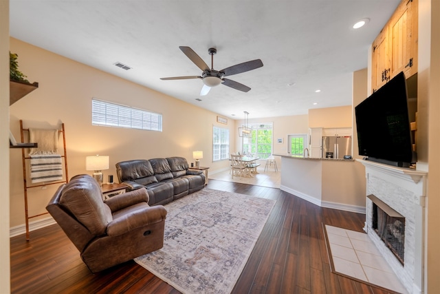 1842 Acorn Ridge Trl, Tallahassee, FL 32312 - living area featuring ceiling fan, dark wood-style floors, recessed lighting, baseboards, and a tile fireplace