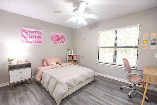 bedroom featuring hardwood / wood-style flooring and ceiling fan