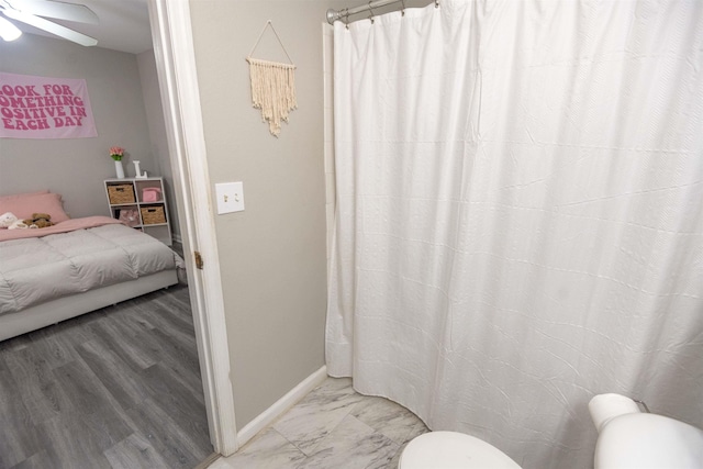 bathroom featuring ceiling fan