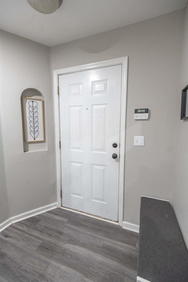 doorway featuring dark hardwood / wood-style floors