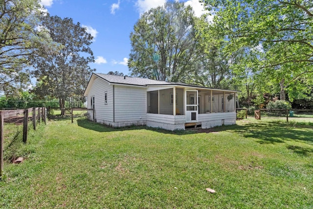 11124 Bexhill Ln, Tallahassee, FL 32317 - exterior space featuring a sunroom, a yard, and fence