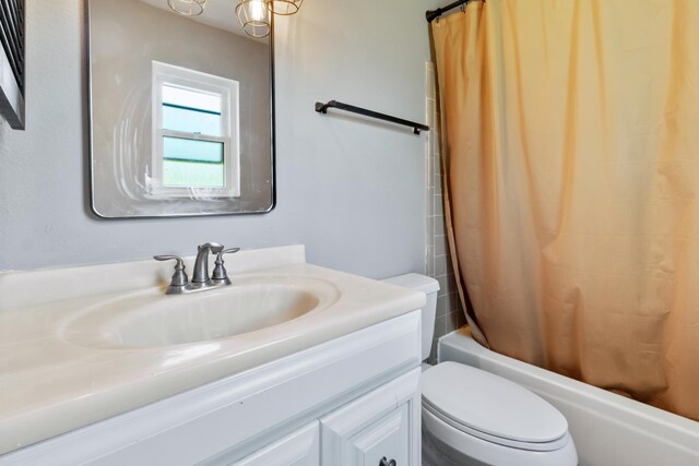 11124 Bexhill Ln, Tallahassee, FL 32317 - bathroom with shower / bath combo, toilet, and vanity