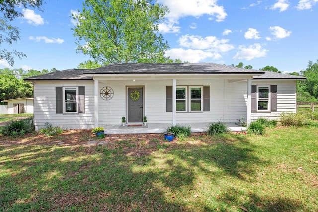 11124 Bexhill Ln, Tallahassee, FL 32317 - view of front of property with a front lawn and covered porch