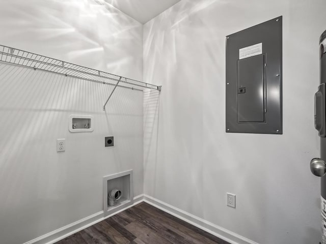 washroom featuring hookup for a washing machine, electric dryer hookup, dark wood-type flooring, and electric panel