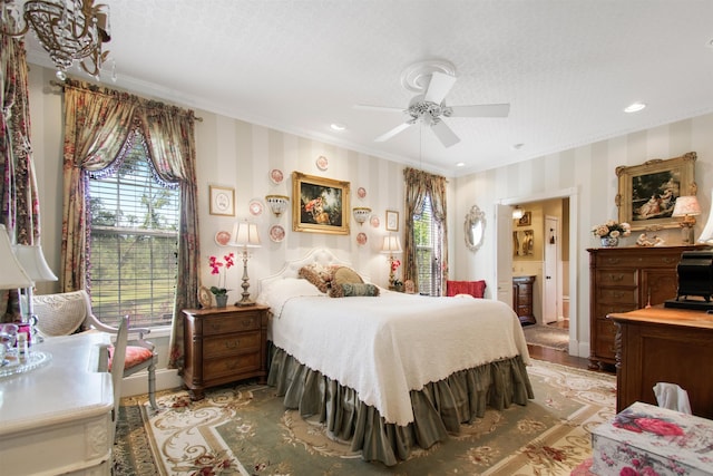 2460 Canopy Ln, Perry, FL 32347 - bedroom featuring ornamental molding, wallpapered walls, recessed lighting, ceiling fan, and ensuite bath