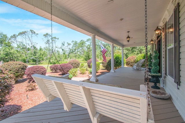 2460 Canopy Ln, Perry, FL 32347 - wooden terrace with covered porch