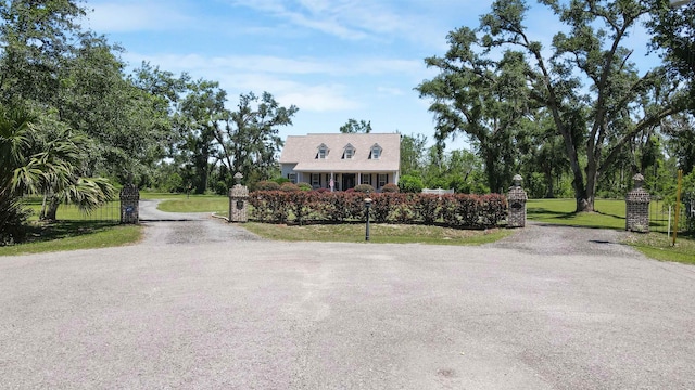 2460 Canopy Ln, Perry, FL 32347 - view of front of home featuring driveway and a front lawn