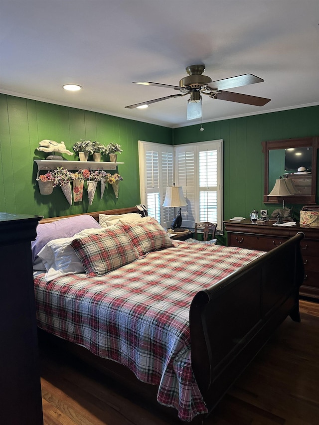 bedroom featuring wood-type flooring and ceiling fan