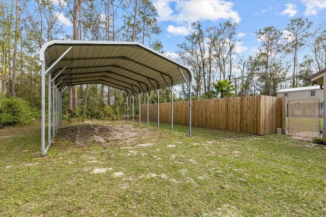 view of parking featuring a lawn and a carport