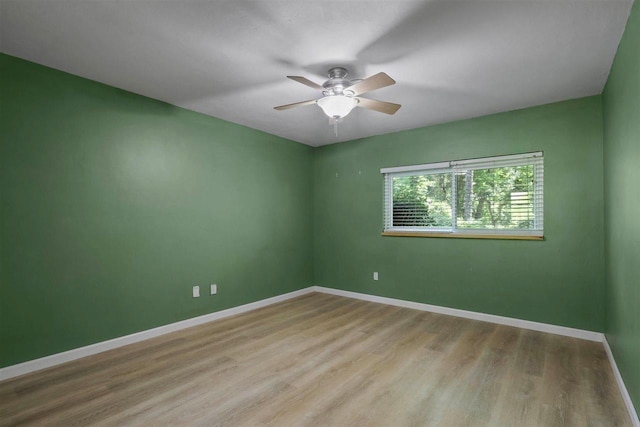 2307 Spoonwood Dr, Tallahassee, FL 32303 - unfurnished room with a ceiling fan, wood finished floors, and baseboards