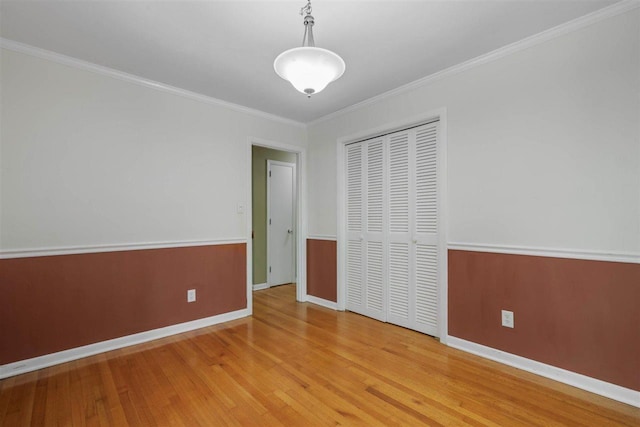 2307 Spoonwood Dr, Tallahassee, FL 32303 - empty room with baseboards, wood finished floors, and crown molding
