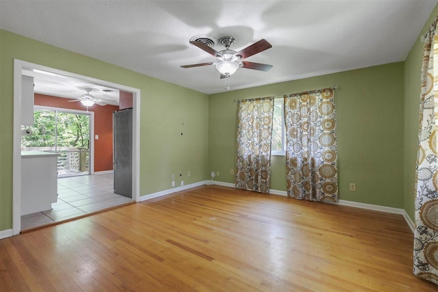2307 Spoonwood Dr, Tallahassee, FL 32303 - empty room featuring wood finished floors, ceiling fan, and baseboards