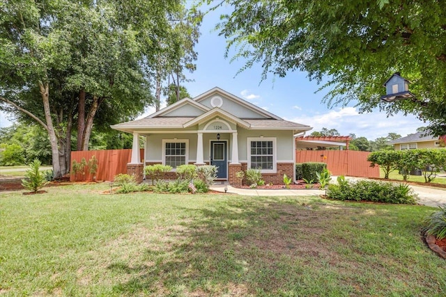 1224 Athens Ct, Tallahassee, FL 32305 - view of front facade featuring brick siding, a porch, and stucco siding