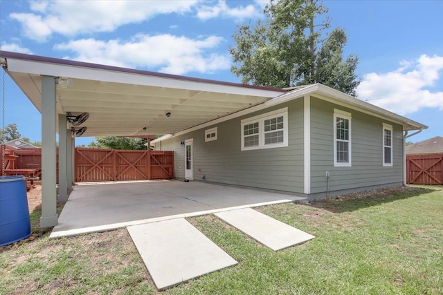 1224 Athens Ct, Tallahassee, FL 32305 - view of front of property featuring an attached carport and a gate