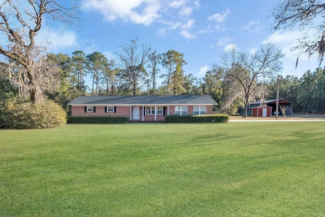 ranch-style house with a front lawn