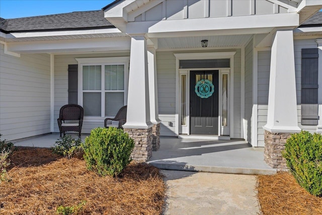 doorway to property featuring a porch