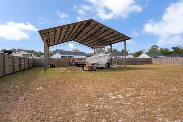 view of yard with a carport