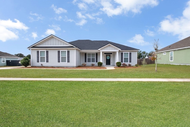 ranch-style house with a front yard