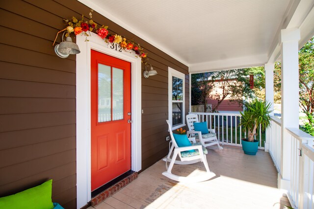 entrance to property with covered porch