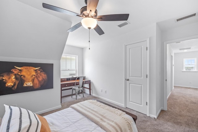 carpeted bedroom with ceiling fan