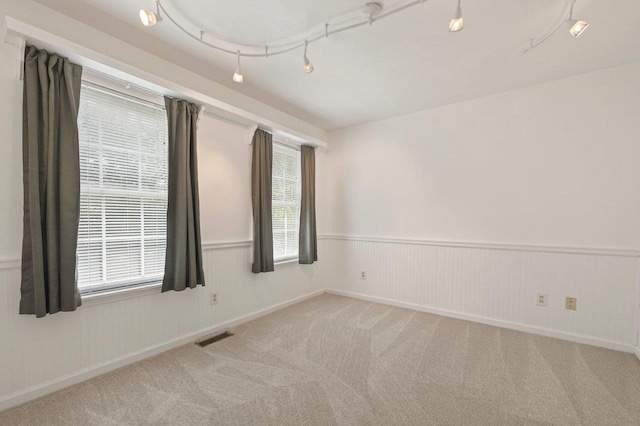 2903 Whirlaway Trl, Tallahassee, FL 32309 - carpeted empty room with a wainscoted wall