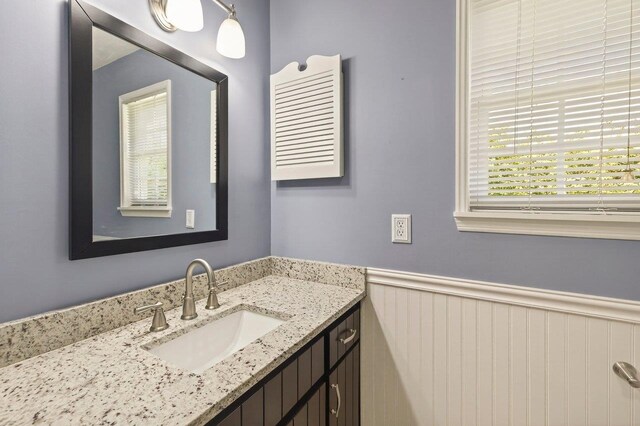 2903 Whirlaway Trl, Tallahassee, FL 32309 - bathroom featuring a wainscoted wall and vanity